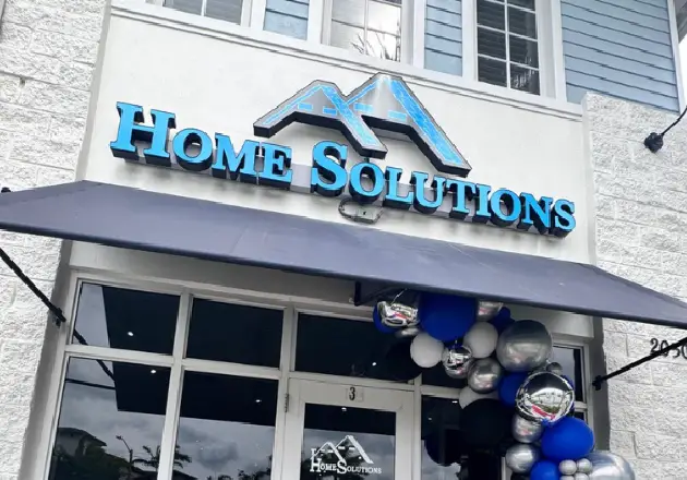 Window technician installing a window